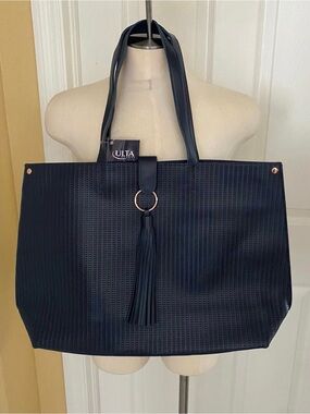 New womens Ulta Beauty Navy Perforated Tote with Tassel Ring Accent